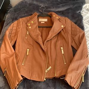 MichaelKors leather jacket.Zipper detailGood condition.Rarely worn.Soft leather
